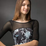 Mikayla-G-5104-copy young woman posing for a headshot inside