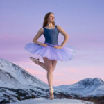 Sammy Moore-4333 girl in a purple and blue tutu with snowy mountains beihind her