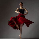 Shannon Wellmann-8379 girl in a red dress spinning while on pointe