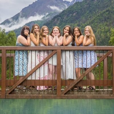 Group of high school senior girls on a bridge